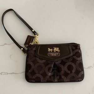 Coach signature collection Wristlet. Brown with logos.